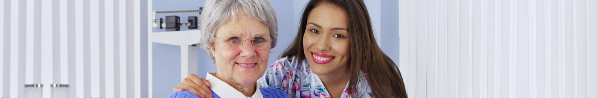 senior women with friendly Mexican caregiver